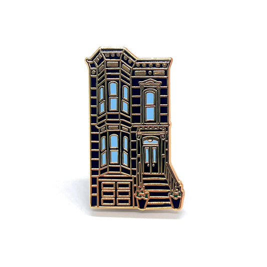 Black San Francisco house pin on a white background