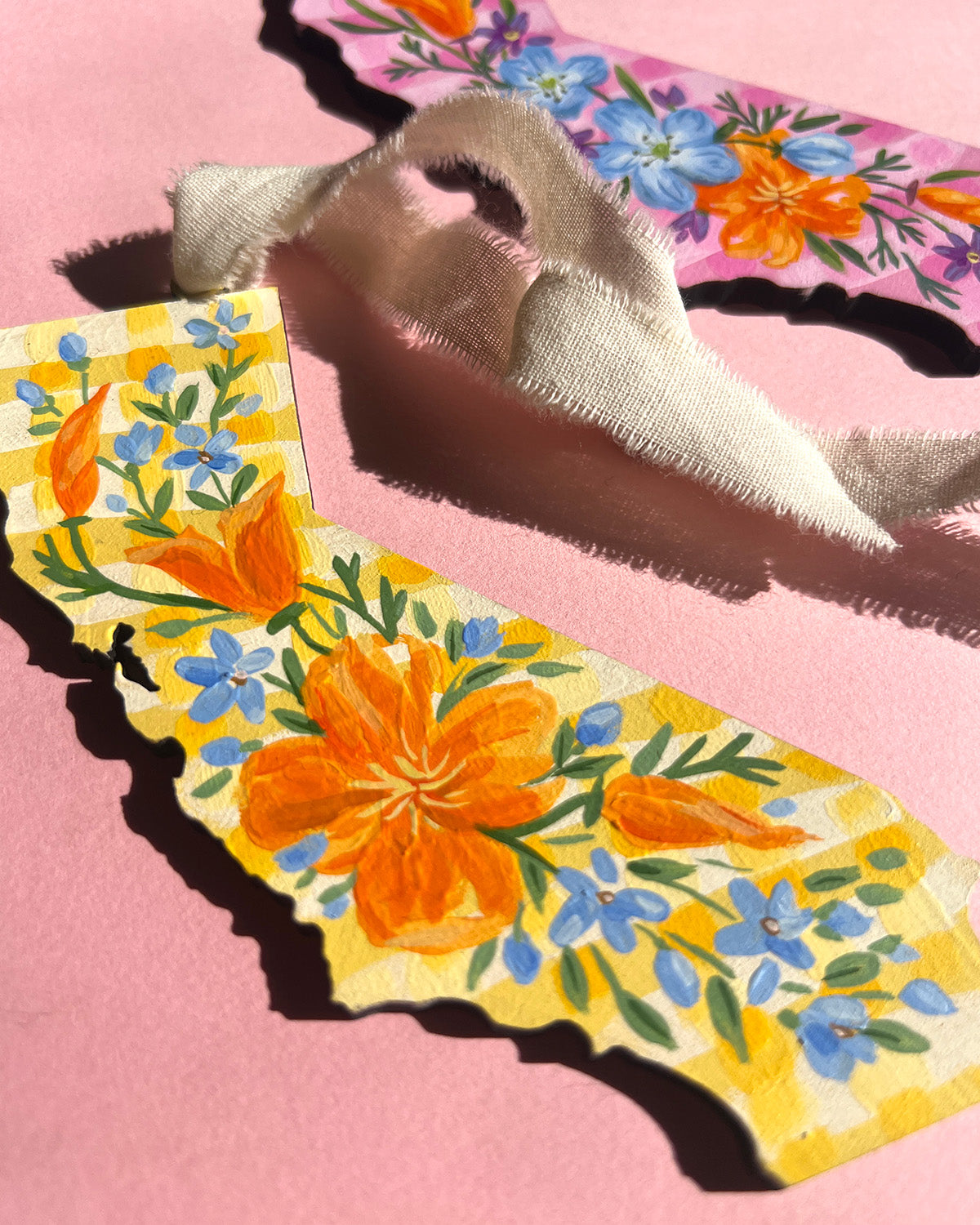 California floral painting on a pink background